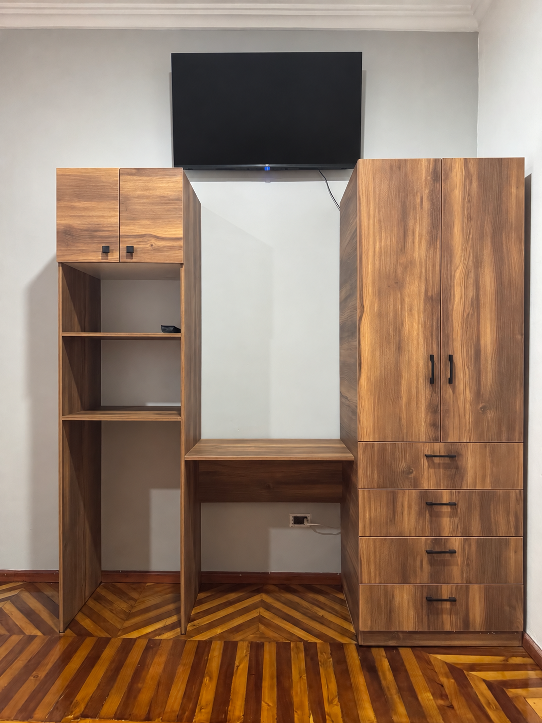 Wardrobe, desk and television