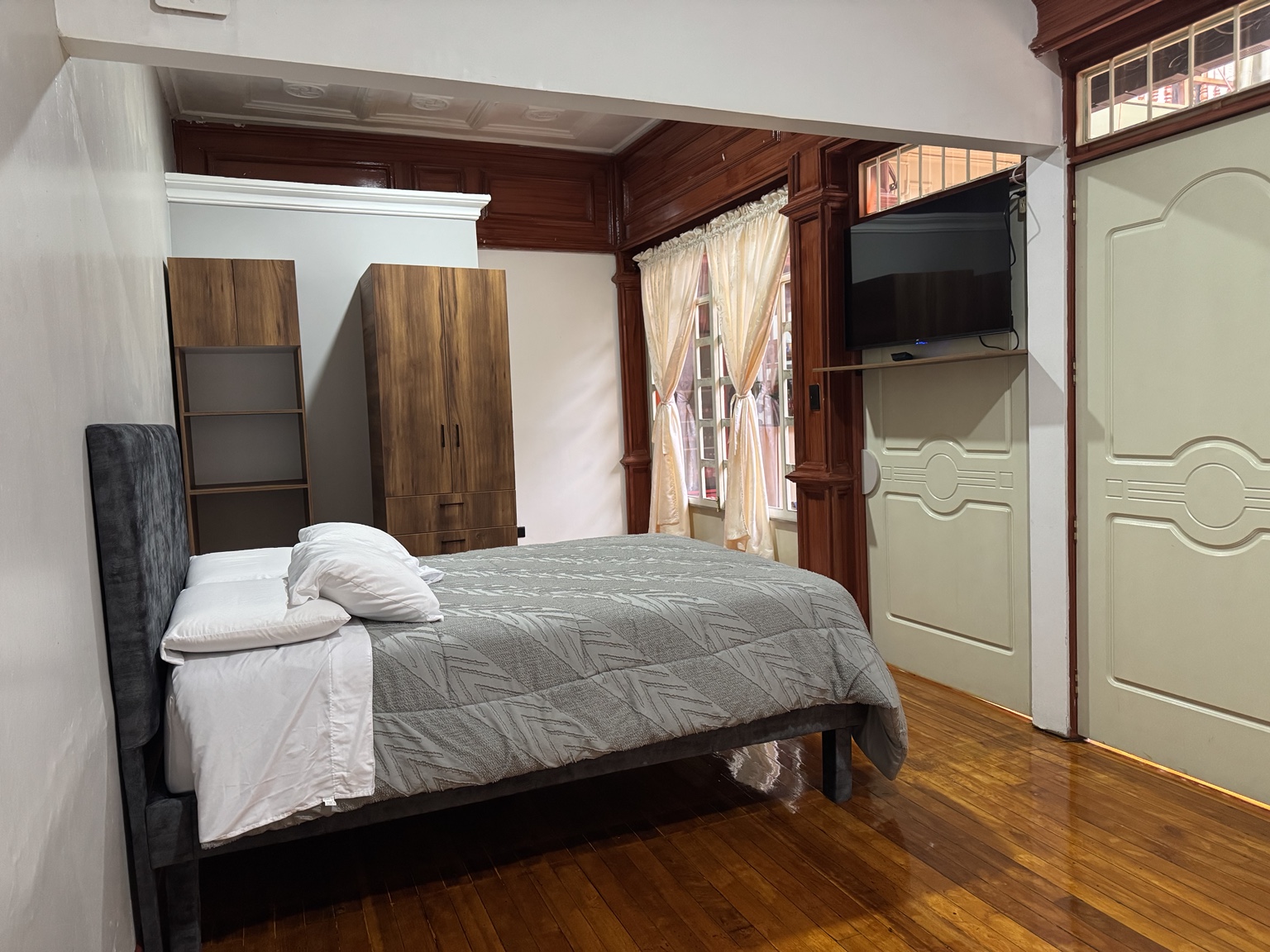 Windows, television and bedroom