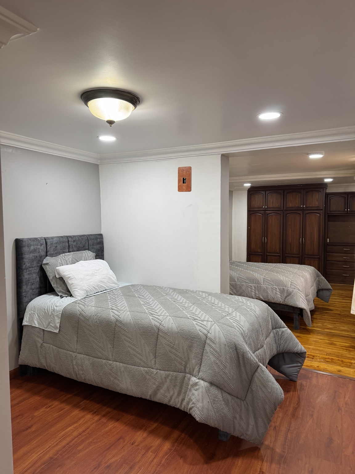 Second bed and view towards the wardrobe